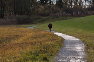 away-walk-sidewalk-woman-backpack-idyll-puddles-1